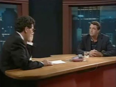 1989 - American sailor Denis Connor walks out during an interview with New Zealand broadcaster Paul Holmes after Holmes suggested that Connor might like to apologise to New Zealand yachtsman Bruce Farr. Photo / TVNZ