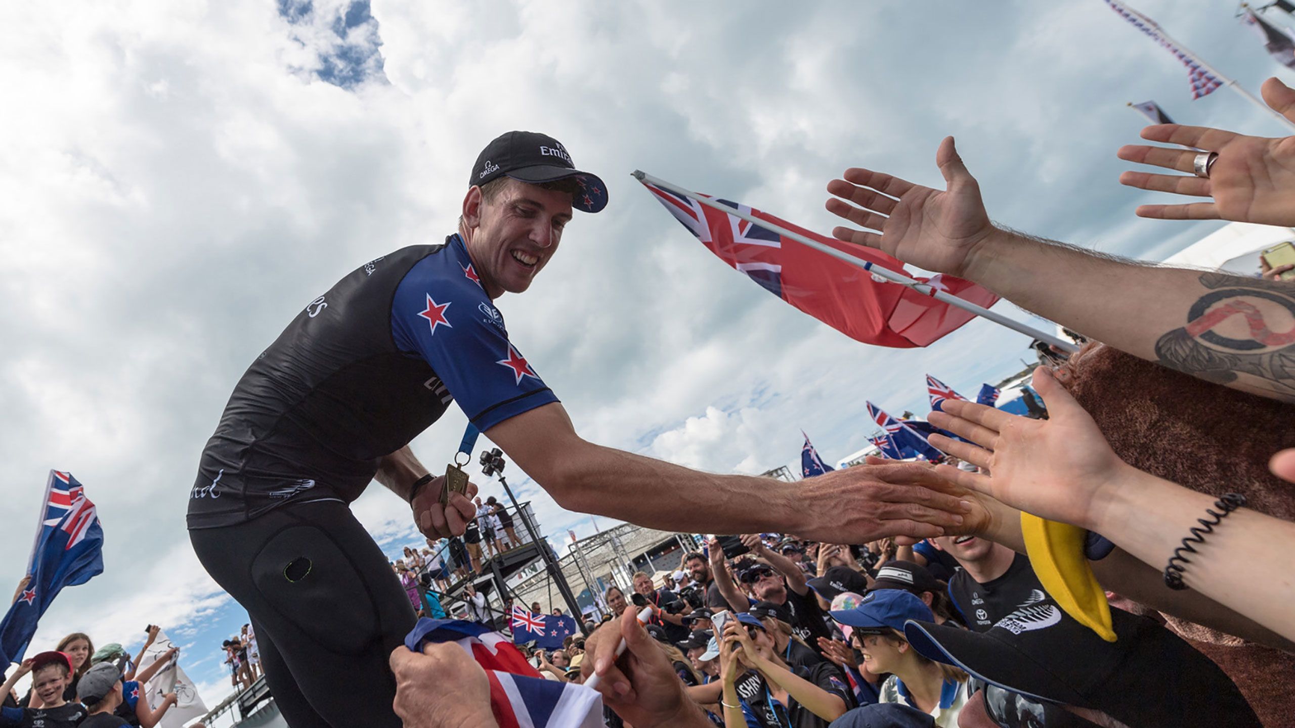Team NZ helmsman Peter Burling celebrates winning the America's Cup.