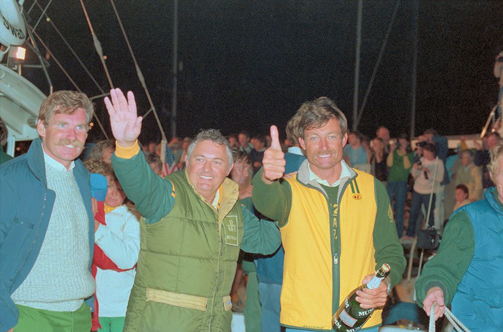 Alan Bond and John Bertrand celebrate after defeating the United States in the America's Cup. Photo / Getty Images.