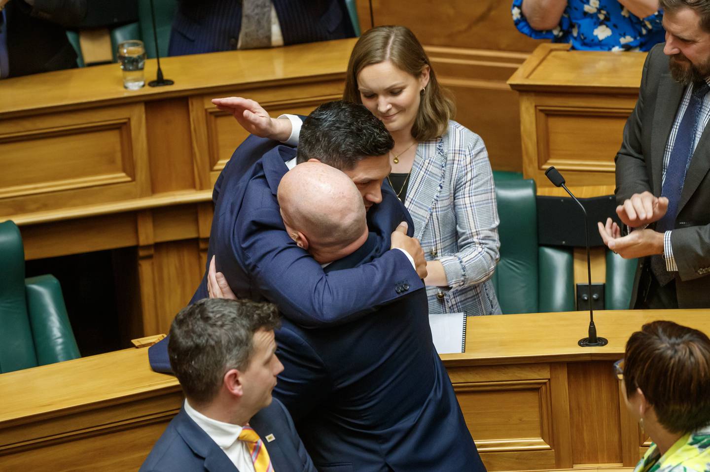 James Meager receiving a hug from Prime Minister Christopher Luxon after his maiden speech. Photo / Mark Mitchell