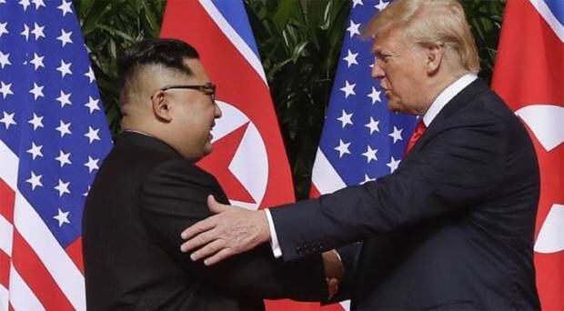 Kim Jong-un with US President Donald Trump last month at their Singapore summit. Photo / AP 