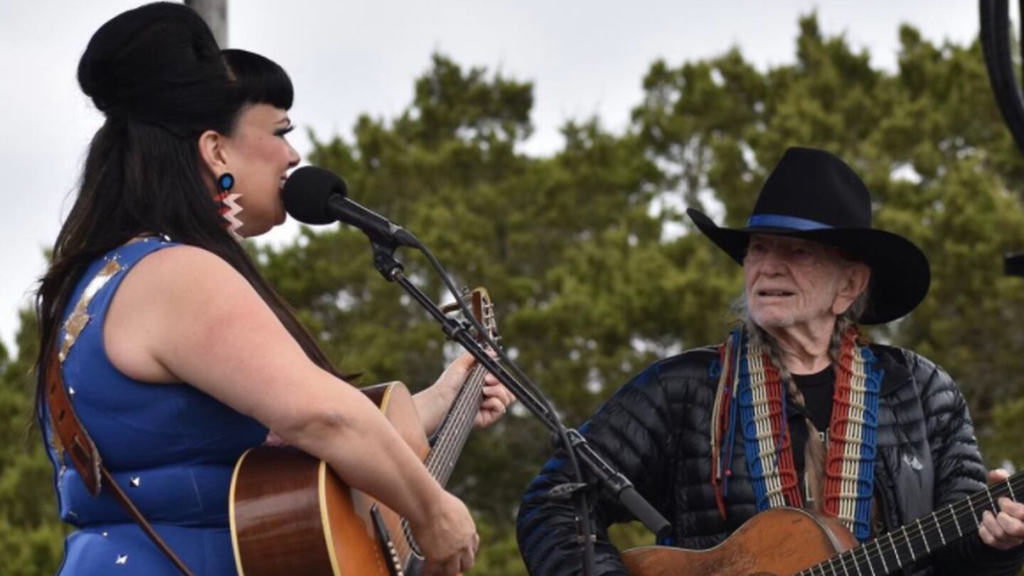 The country star was joined by Willie Nelson for a duet. Photo / @tamineilson / Twitter