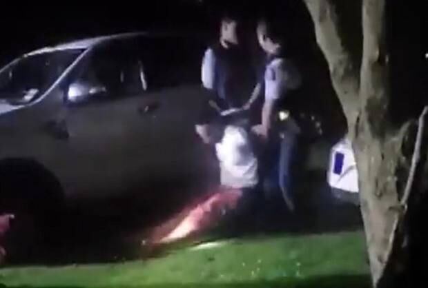 The offender being arrested in Rotorua last night. Photo / Supplied