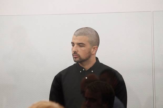 Hunter Macdonald stands in the dock at the Wellington District Court. Photo / Melissa Nightingale