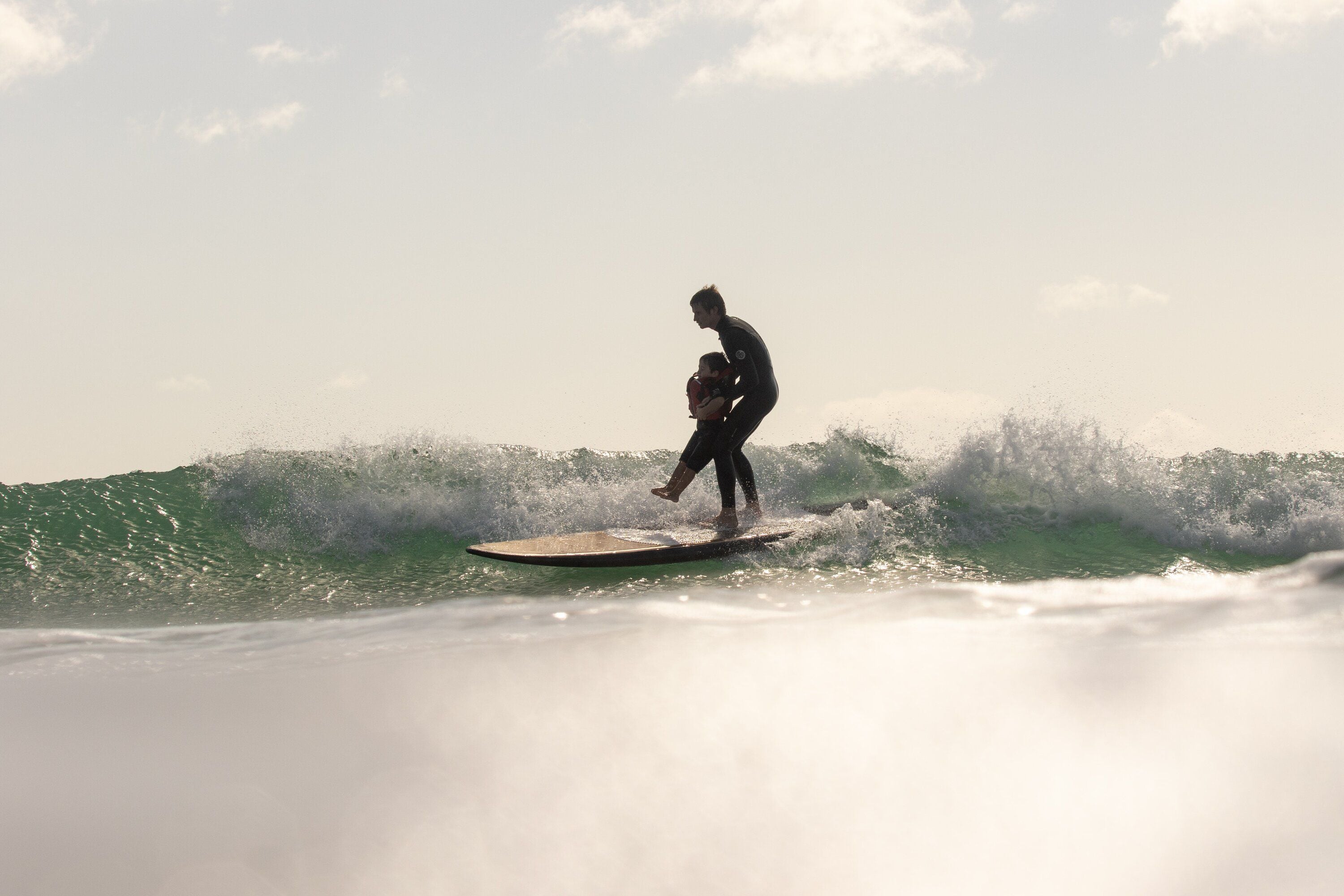 Kids with autism spectrum disorder got to ride the waves of Mt Maunganui with Surfers Healing, on February 1.