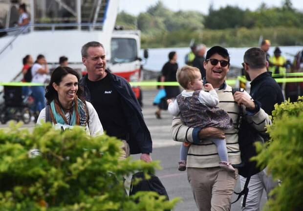 Ardern, Clarke Gayford and Neve arrive at the airport. Photo / Cook Islands News