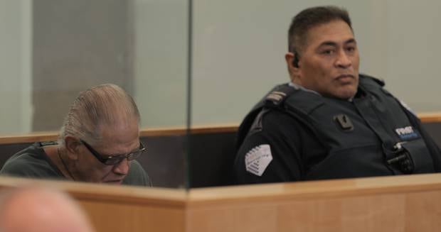 Malcolm Rewa sits in the dock in the High Court at Auckland. Photo / Michael Craig