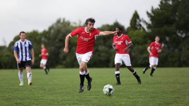 Two goals by Scott Burney, including a controversial one in the last minute of extra time, allowed Wanganui Athletic to prevail over Port Hill United via penalty shootout in Napier.