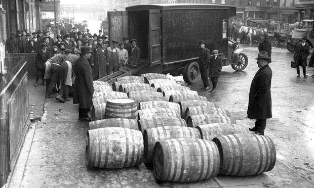 Prohibition agents confiscate barrels of wine on the streets of New York City. Photo / Getty Images