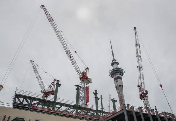 NZICC cranes beneath the SkyTower. Photo/Peter Meecham