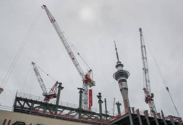 NZICC cranes beneath the SkyTower. Photo/Peter Meecham