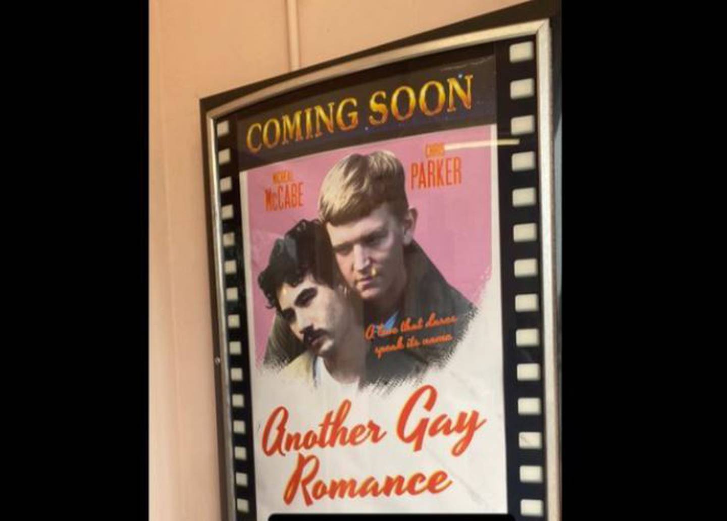 Chris Parker and his new husband, Micheal McCabe, in a mocked-up movie poster on display at The Hollywood