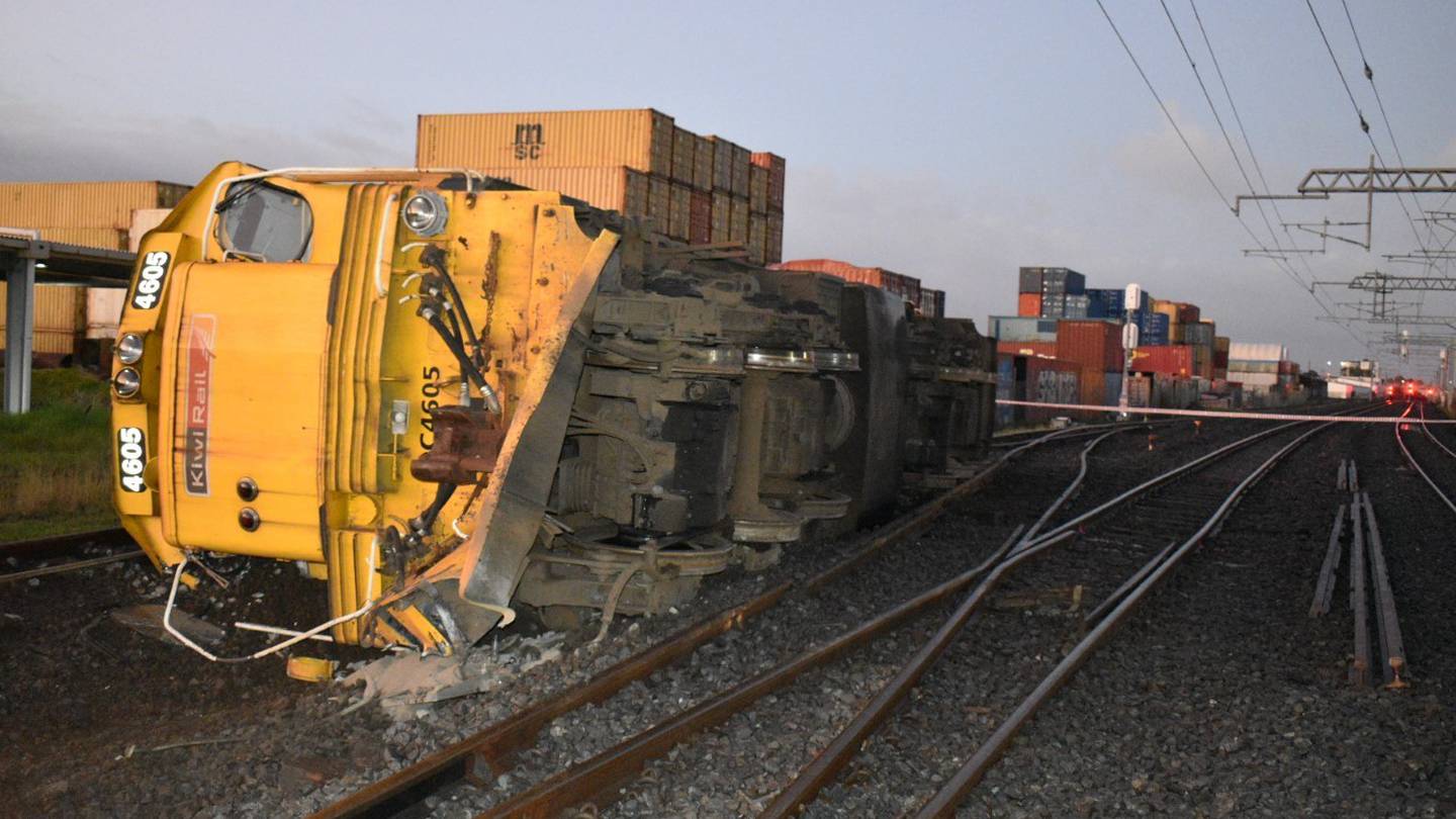 A switcher carriage came off the tracks this morning near St Johns in Auckland. Photo / Darren Masters