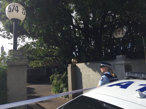 The entrance to a gentleman's club at 574 Manukau Rd is cordoned off by police. 