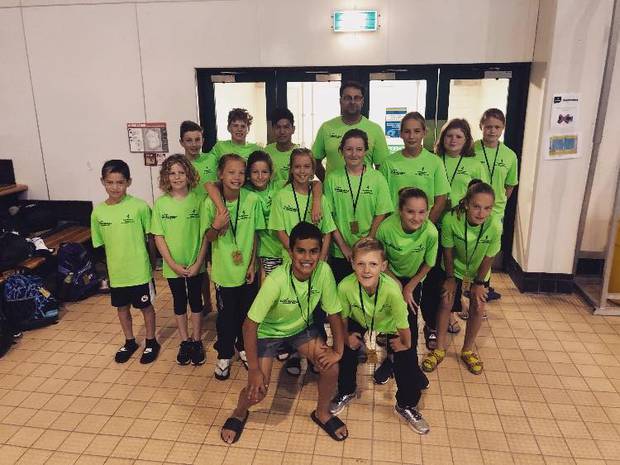 Andy McLay, at back, with the Whanganui Swim Team juniors at the Wellington All Stars national carnival in February.