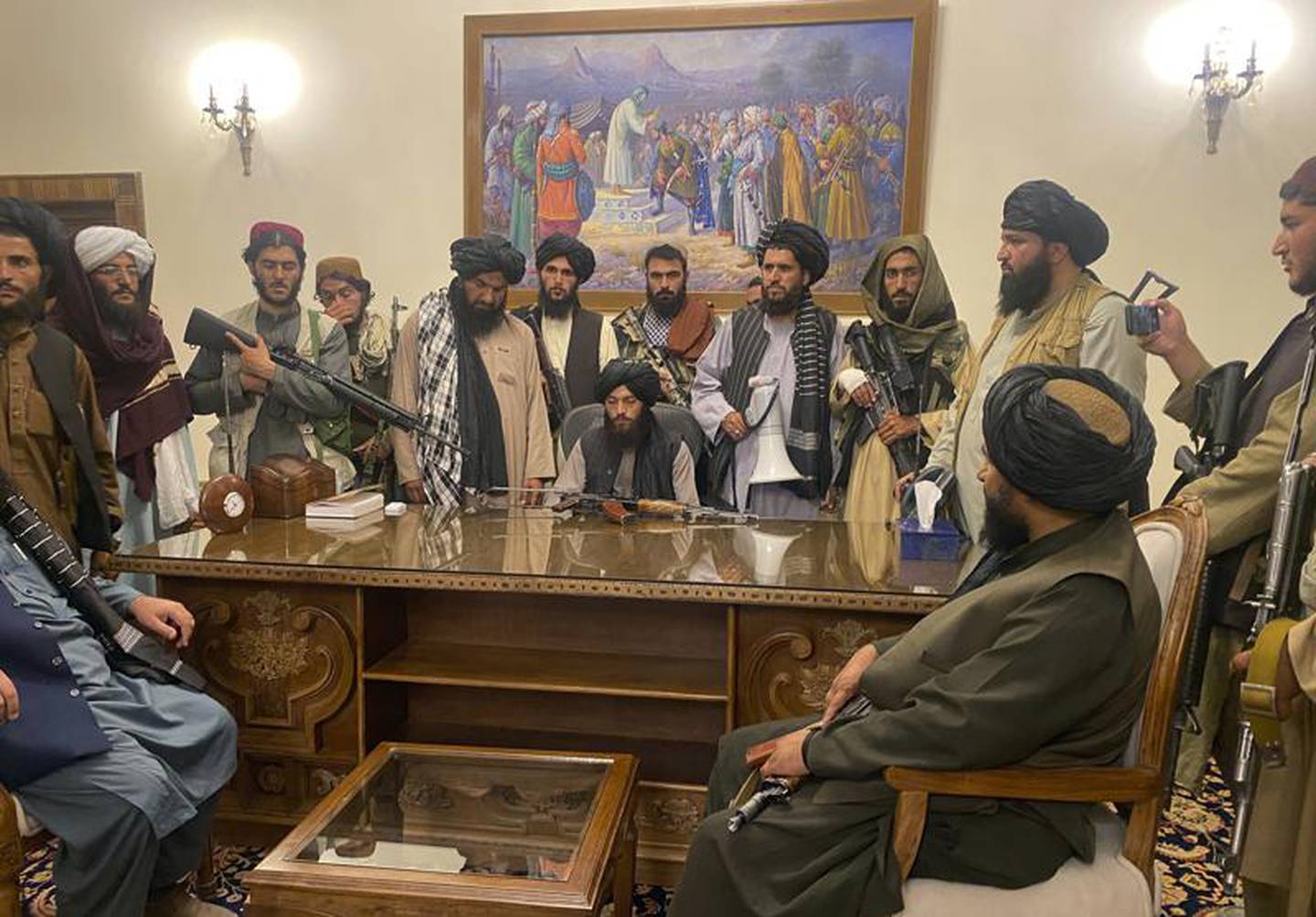 Taliban fighters take control of Afghan presidential palace after the Afghan President Ashraf Ghani fled the country, in Kabul, Afghanistan, Sunday, Aug. 15, 2021. Photo / AP