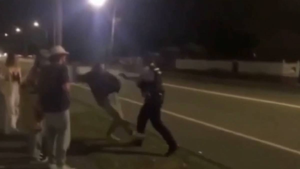 Watch: Christchurch policeman calls woman 'skank' and shoves man to the ground