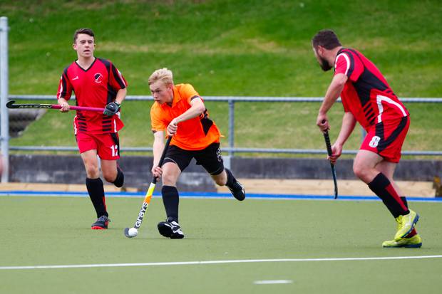 Travis Bayler looks to open up the Marton defenders in the first half.