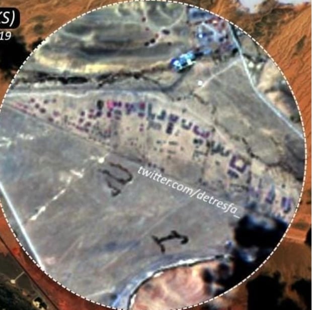 Zooming in on the image appears to show a stockpile of military equipment and a massing of troops. Photo / Supplied 