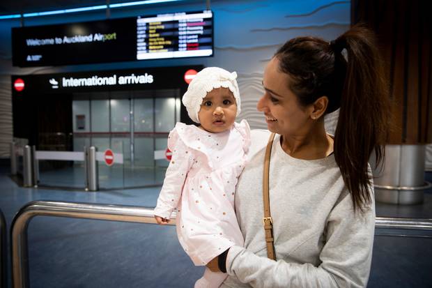 Reema Rashika with daughter Kyra Naidu, 8 months. Rashika's last experience of travelling out of Auckland Airport was so stressful she's staying home for the next couple of years. Photo / Dean Purcell