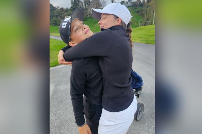 Tania Ellis, 17, hugging her brother Elijah Ellis, 11. Photo: Supplied.