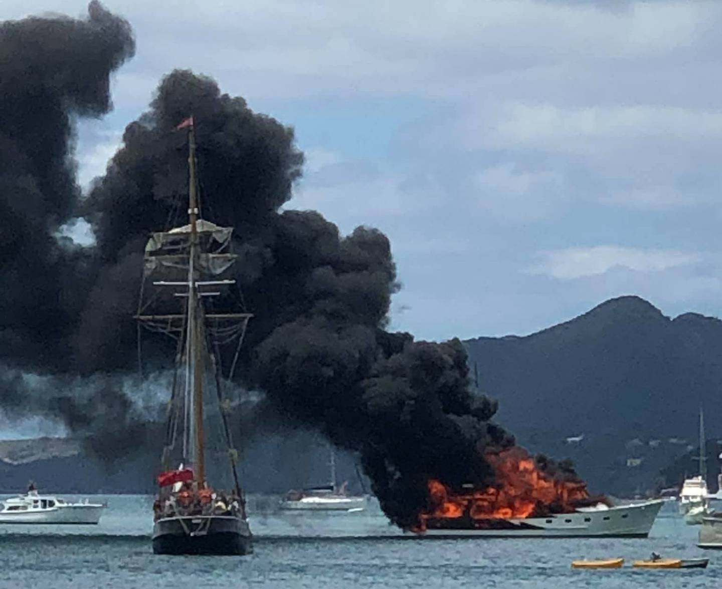 The boat caught fire off Moturura Island yesterday and was engulfed in minutes. Photo / Whangaruru Volunteer Coastguard