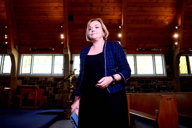 Judith Collins has been accused of politicising her faith by praying in front of cameras in a church before voting. Photo / Getty