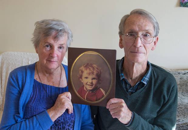Dave and Marlena Peacock with a portrait of their son Ashley Peacock in 2016.