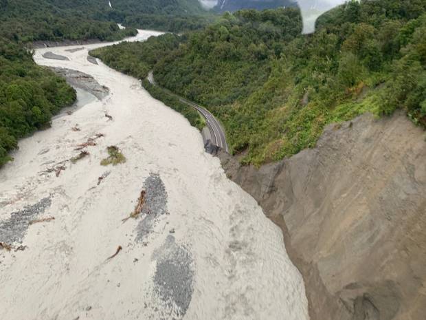 A large section of road has been completely washed away. Photo / Wayne Costello, DOC 