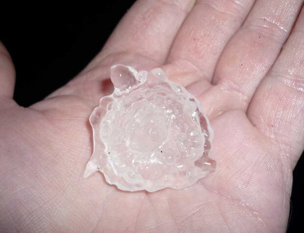 Hail the size of golf balls pelted a West Auckland man's house tonight. Photo / Supplied
