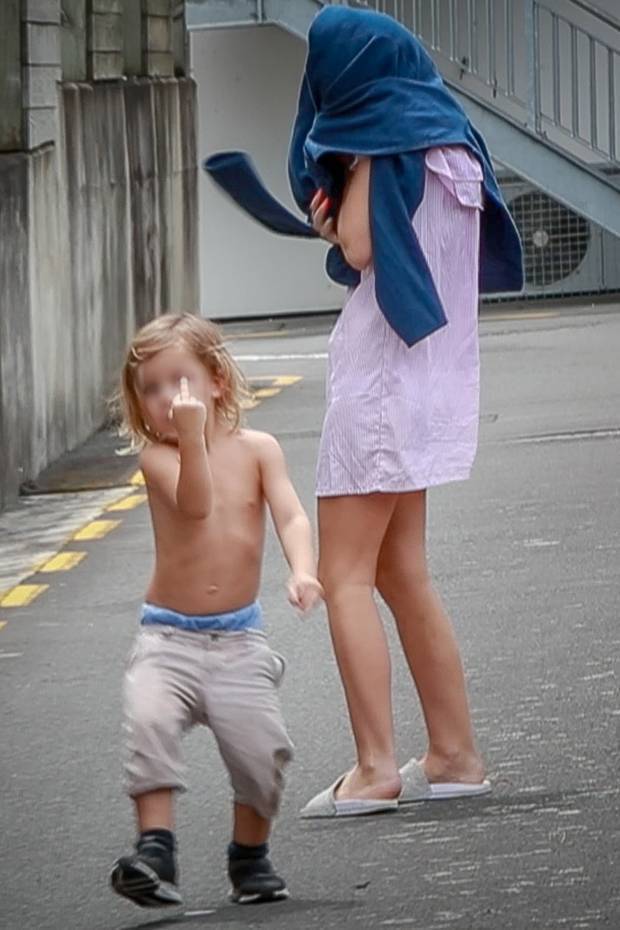 Members of the family near the Hamilton District Court. Photo / Chris Cornege