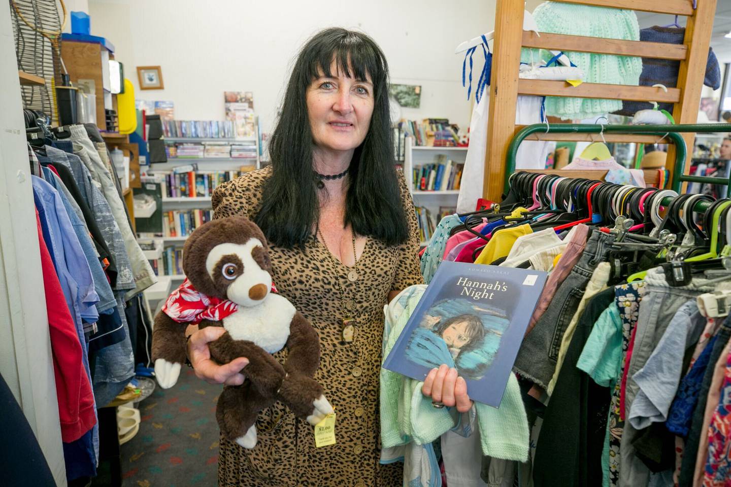 PSEC Taradale Charity Shop manager Ruth Vincent with items for sale.