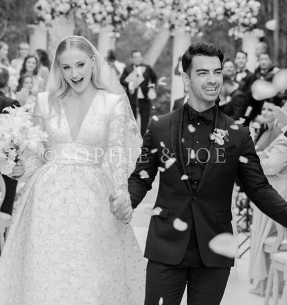 A beauty in lace: Sophie Turner is breathtaking in her custom-made Louis  Vuitton gown as she shares the first photos from her second wedding to Joe  Jonas - NZ Herald