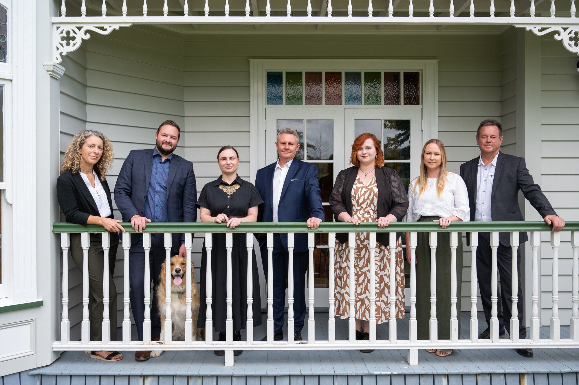 Hope Family Funeral director Eva Wolf and the rest of the team: Oliver Marriner, Harley (the dog), Elise Williams, Dean Hughes, Lydia Burney, Alex Marriner and Tony Hope. Photo / David Hall