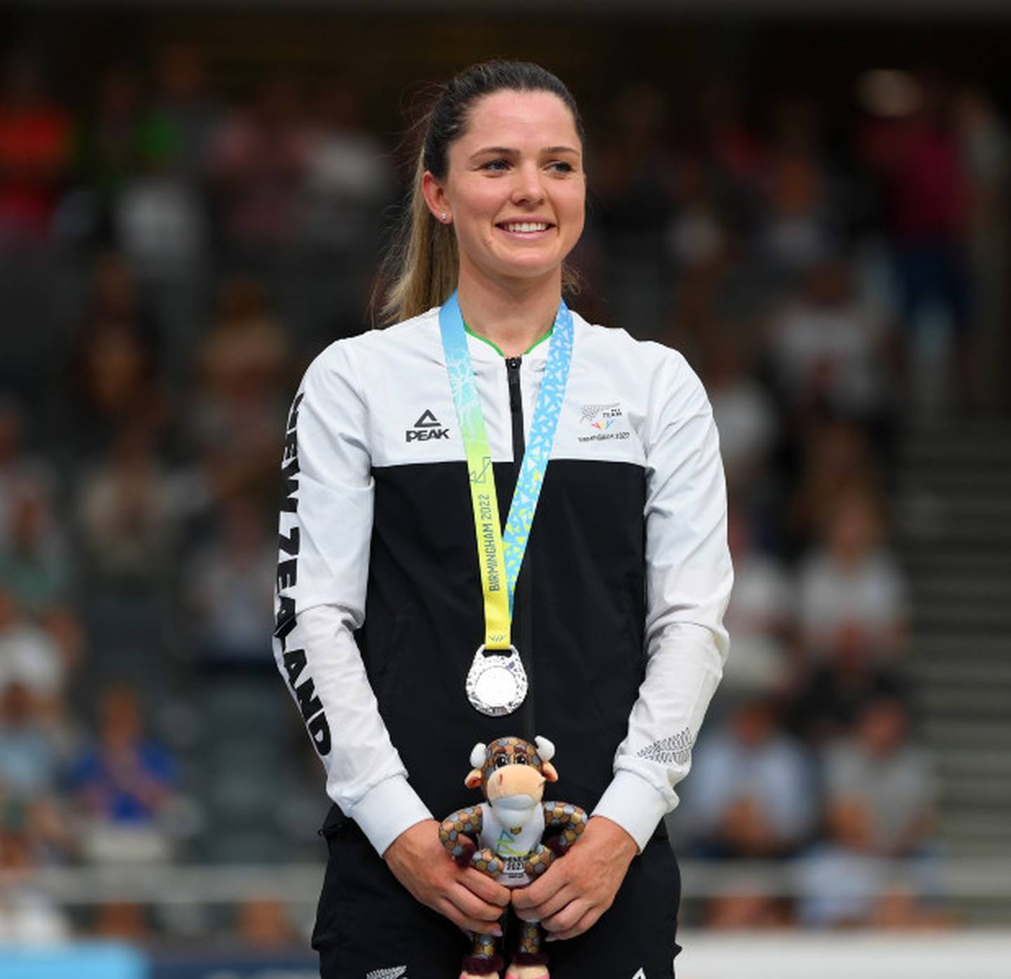 Michaela Drummond on the podium with her silver medal. Photography / Photosport