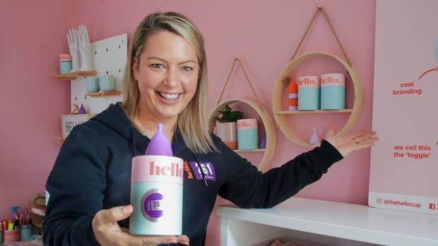 Hello Cup co-founder Robyn McLean offering an alternative to tampons for New York Marathon runners. Photo / Warren Buckland
