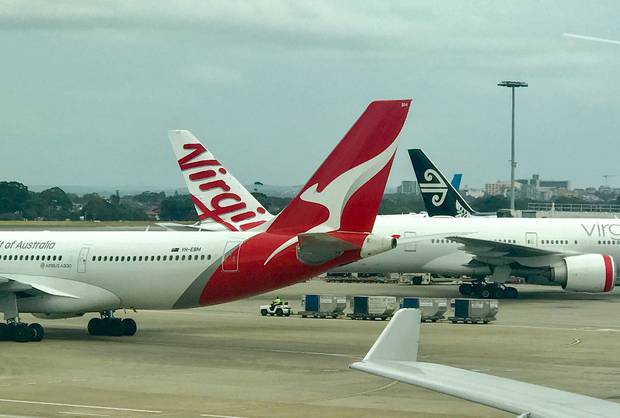 Airlines say charges and fees make up 53 per cent of an Economy fare across the Tasman. Photo / Grant Bradley