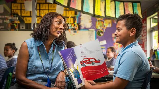 Milan Muller (right), inspired by his astronaut ancestor, has honed his writing skills with children's author Vasanti Unka (left). Photo / Greg Bowker