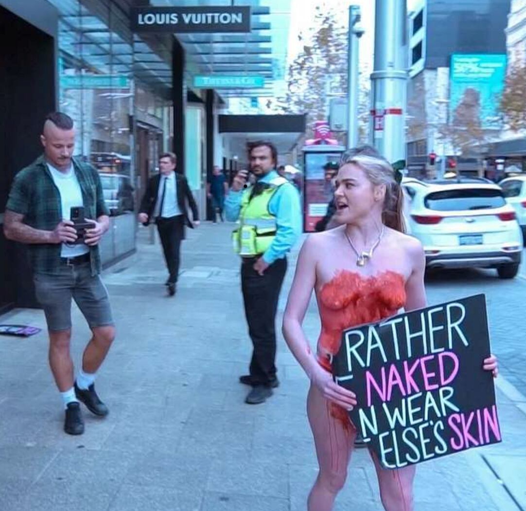Activist Tash Peterson's semi-naked protest in Perth Louis Vuitton store -  NZ Herald