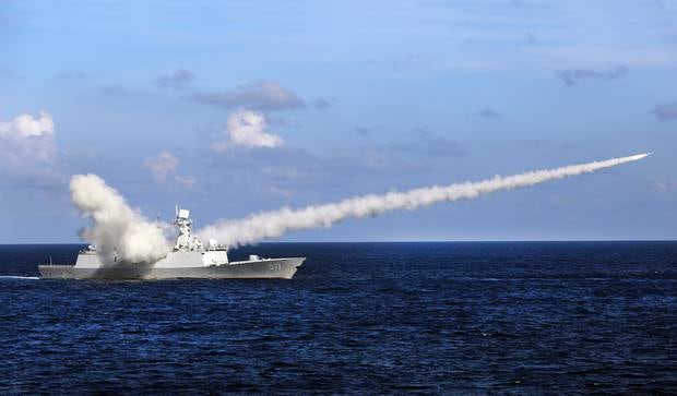 Chinese missile frigate Yuncheng launches an anti-ship missile during a military exercise as tensions brew in the South China Sea. Photo / AP