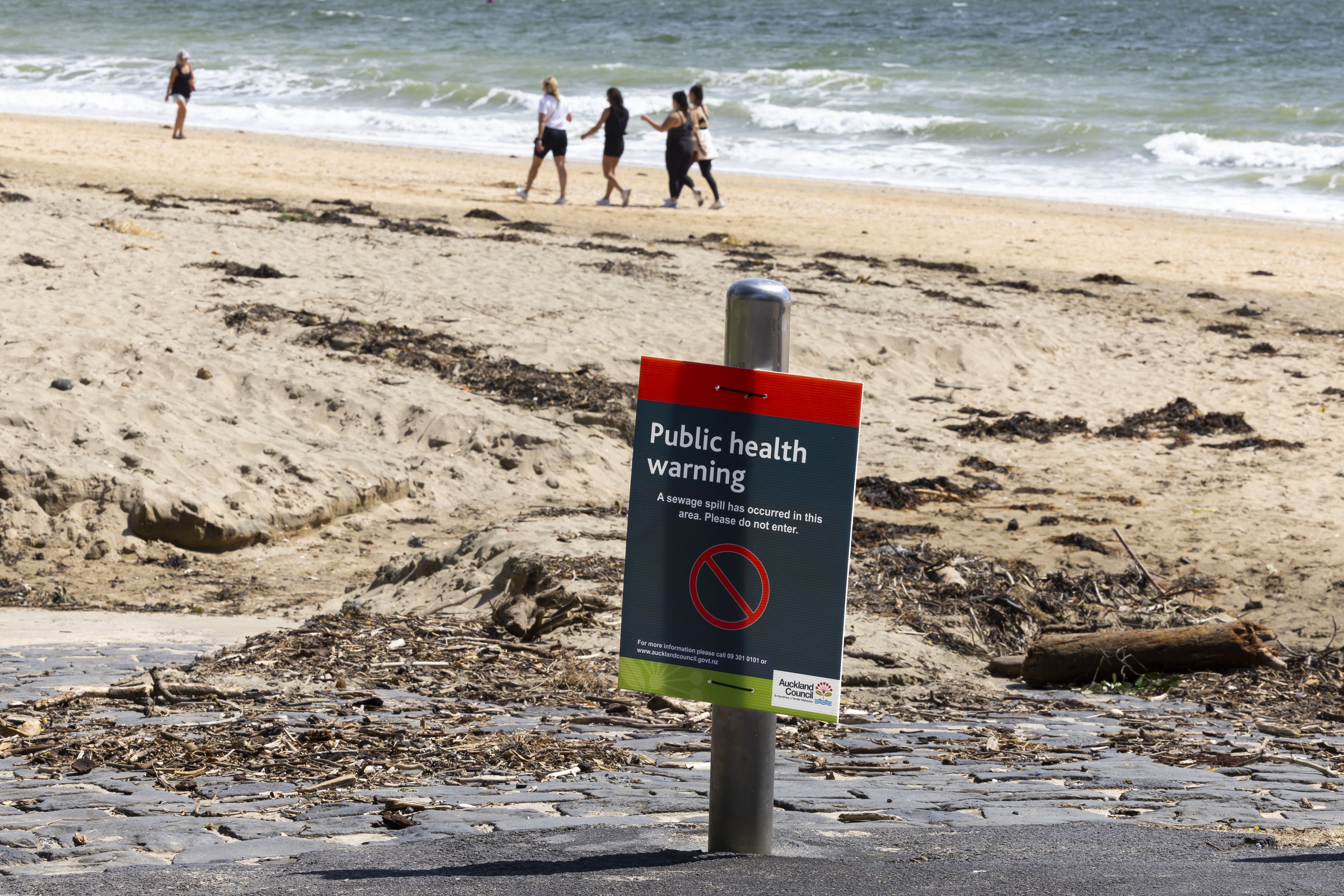 As sunshine finally arrives, at least 19 Auckland beaches remain off-limits  - NZ Herald