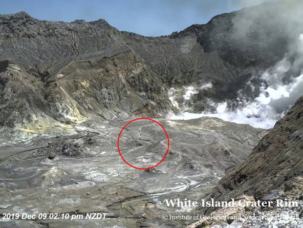 People can be seen inside the crater just before the eruption. Photo / GeoNet