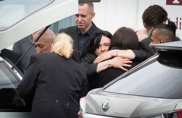 Mourners at the funeral of Artemiy Vldimirovich Dubovskiy yesterday. Photo / Martin Hunter