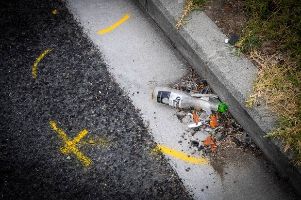 Paint marks a location in Clayburn Rd, Glen Eden, where a number of people were injured after a collision with a car outside a party on Sunday morning. Photo / Jason Oxenham.