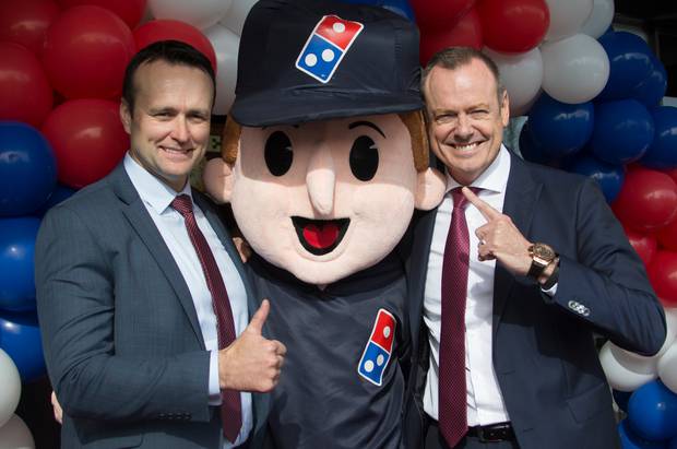 Domino's Pizza general manager Scott Bush (left) along with the mascot and Group CEO of Domino's Pizza Don Meij (right). Photo / File