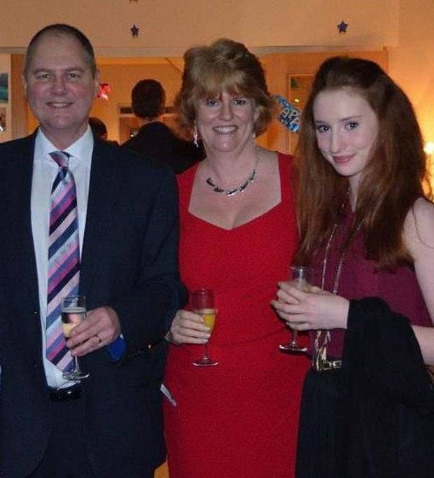 Alana Cutland, 19, from Milton Keynes, pictured with her parents Alison and Neil, who were bringing her home to Britain from Madagascar after she became unwell on her research trip. Photo / Supplied