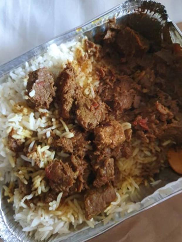 Dinner of lamb curry and basmati rice is served at Jet Park Hotel in Auckland. Photo / Monique Bensemann