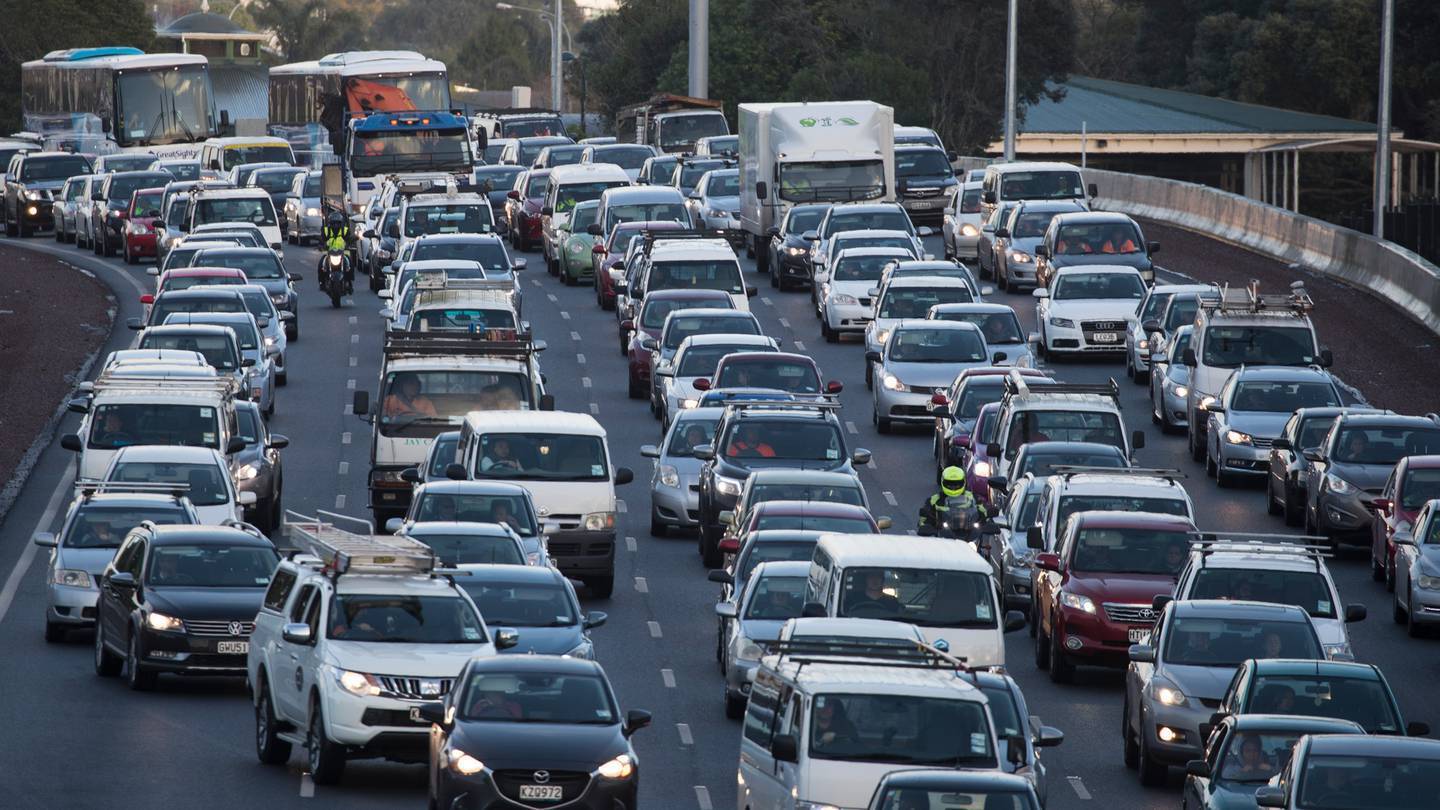 A combination of poor weather, peak hour and the start of school holidays is expected to disrupt Auckland traffic this evening. Photo / NZME