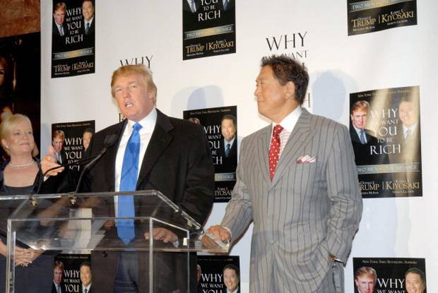 Donald Trump and Robert Kiyosaki promoting the launch of their book Why We Want You to Be Rich: Two Men-One Message in 2006. Photo/Getty Images. 