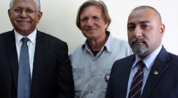 Malaysian investigator Aslam Khan, Blaine Gibson and Malaysian Consul Zahid Raza, who was assassinated just days after this photo was taken. Photo / Blaine Alan Gibson / Facebook / Supplied 